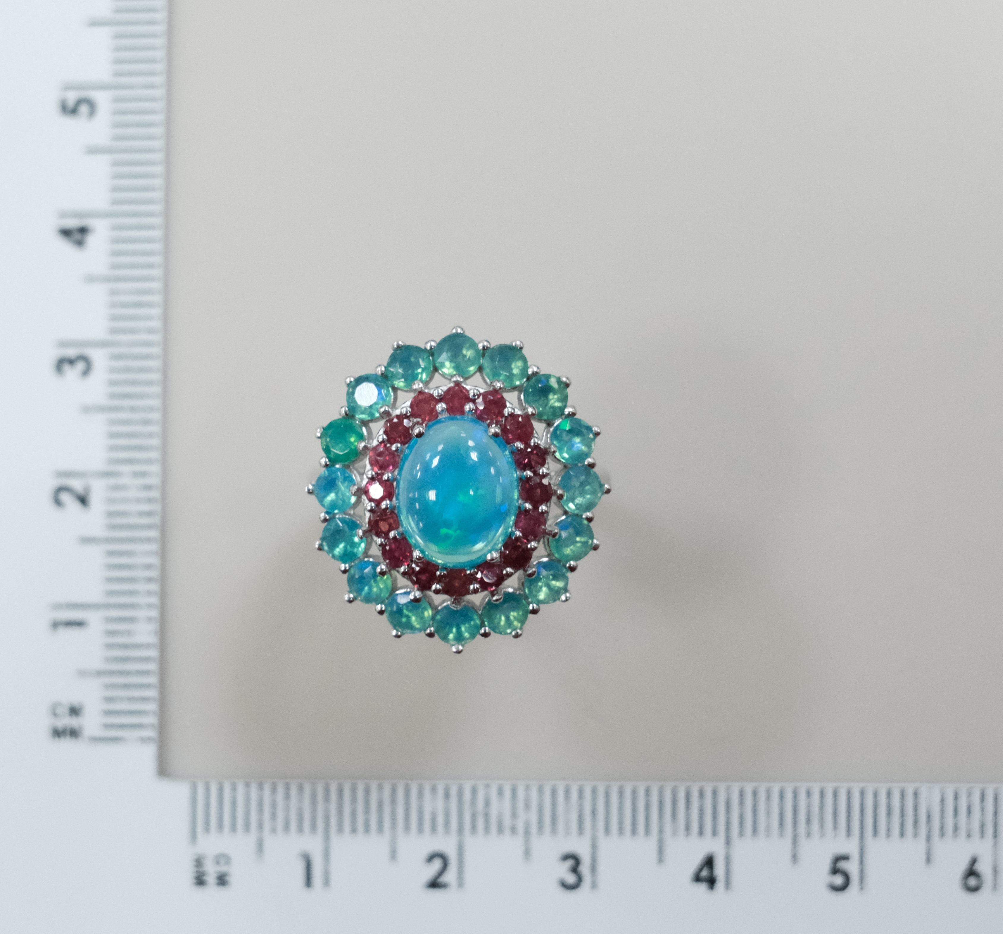 Серебряное кольцо с голубыми опалами